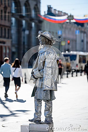 Russia, Saint Petersburg, may 23, 2020:a human artist depicts a monument on the street. Editorial Stock Photo