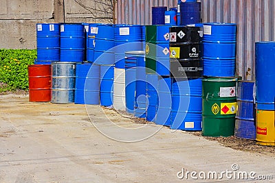 RUSSIA, SAINT-PETERSBURG May16.2019 multicolored metal barrels with chemical waste or raw materials Editorial Stock Photo