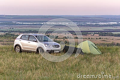 A parking lot at the top of the hill with a view of the steppe valley on a spring day Editorial Stock Photo