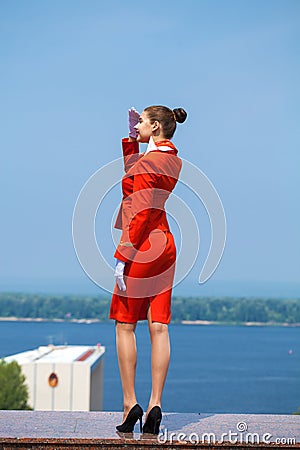 RUSSIA, SAMARA: 26 JULE 2019. Beautiful stewardess dressed in official red uniform of Aeroflot Airlines Editorial Stock Photo