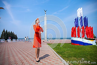 RUSSIA, SAMARA: 26 JULE 2019. Beautiful stewardess dressed in official red uniform of Aeroflot Airlines Editorial Stock Photo