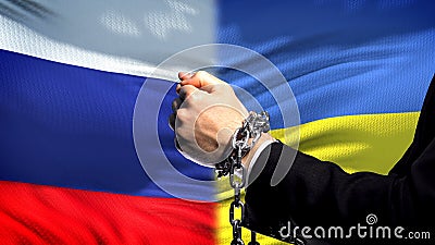 Russia sanctions Ukraine, chained arms, political or economic conflict, business Stock Photo