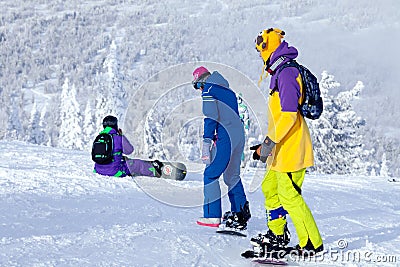 Russia, Sheregesh 2018.11.78 Professional snowboarders in bright Editorial Stock Photo