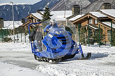 ski resort, Mountain Rescue Service, Rosa Khutor, Sochi, Russia, snowmobile rescuer Editorial Stock Photo