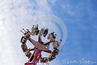 Russia, Sochi 14.05.2022. A large circular attraction rotating turned the laughing people upside down lifting them high Editorial Stock Photo