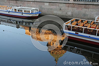 Russia, St. Petersburg, Early morning over the Moika River. An unusual extraordinary plot. Reflection of the dome of the Kazan Cat Editorial Stock Photo