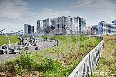 Russia, St.Petersburg, 07 July 2023: Expressway of the western high-speed diameter in clear sunny weather, green lawns Editorial Stock Photo
