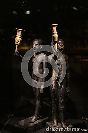 Russia, St. Petersburg - March 10, 2023: Black figurines of men in the Museum of Ancient Egypt Editorial Stock Photo