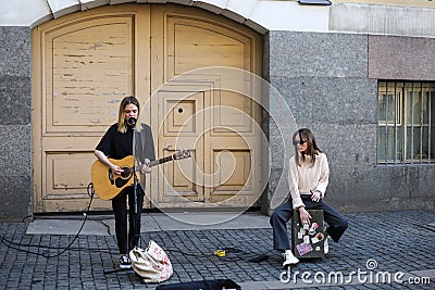 Russia St. Petersburg Palace Square May 7 2022 Two young girls street musicians perform on the street of the city Editorial Stock Photo