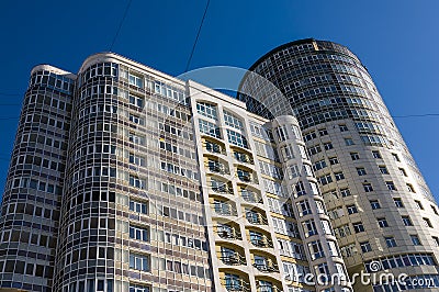 22.03.2017. Russia, Sverdlovsk Region, city of Yekaterinburg, a fragment of the building facade against the blue sky. Modern busin Editorial Stock Photo
