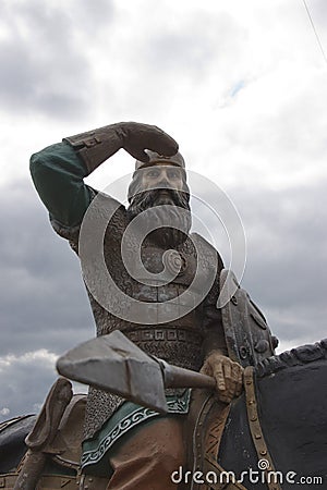 Russia, village Irbeyskoye, July 2019: sculpture Russian knights on the river Bank. hero of Russian epic Editorial Stock Photo