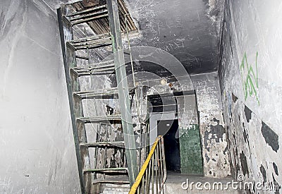 Russia, Vladivostok, 12/16/2017. Dirty interior of staircase in apartment building with very cheap apartments. Editorial Stock Photo