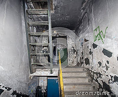 Russia, Vladivostok, 12/16/2017. Dirty interior of staircase in apartment building with very cheap apartments Editorial Stock Photo