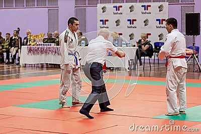 Russia, Vladivostok, 11/03/2018. Jiu-Jitsu wrestling competition among men. Martial arts and fighting sports tournament Editorial Stock Photo