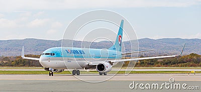 Passenger jet aircraft Boeing 737-900ER of Korean Air South Korea on runway. Aviation and transportation Editorial Stock Photo