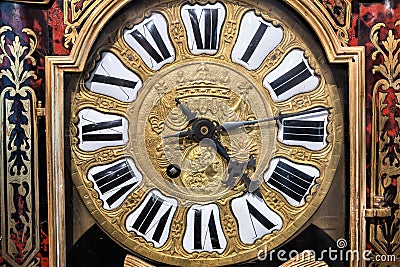 Russia, Yaroslavl, July 2020. Dial of an antique watch with gilded coats of arms of the nobility. Editorial Stock Photo