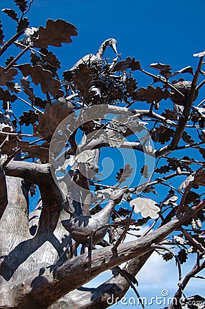 Russia, Zlatoust - September 2019: Bazhov Mountain Park, bronze sculpture of tree and animals. Editorial Stock Photo