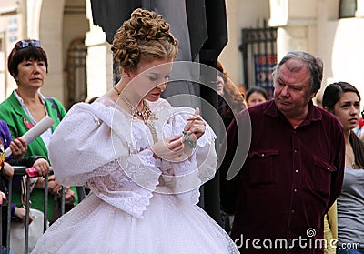 Russian actress in historic costume on the street celebration of birthday of the great Russian writer, Fyodor Dostoevsky Editorial Stock Photo