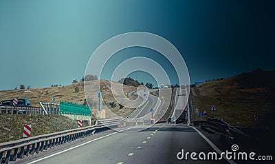 Russian asphalt road. Traveling on the road. Cars on the road. Track. Krasnodar Territory, Russia July 23, 2019 Editorial Stock Photo