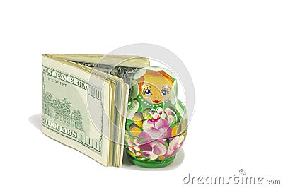 Russian babushka dolls with dollar bills isolated Stock Photo