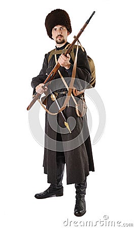 Russian Cossack with a rifle. Stock Photo