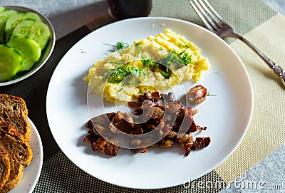 Russian cuisine dish - mashed potatoes with mushrooms Stock Photo