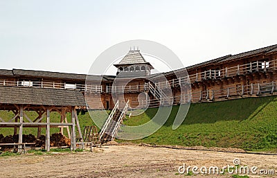 Russian defensive wooden walls of the ancient medieval fortress of Kievan Rus. Editorial Stock Photo