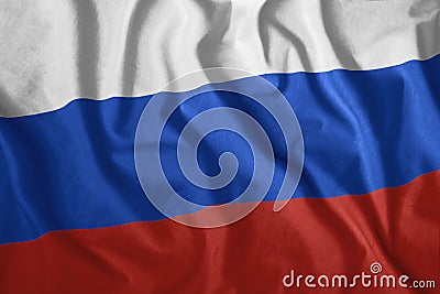 The Russian flag is flying in the wind. Colorful, national flag of Russia. Patriotism. Stock Photo