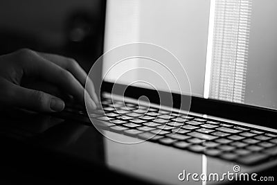 Russian hacker hacking the server in the dark Black and white Stock Photo