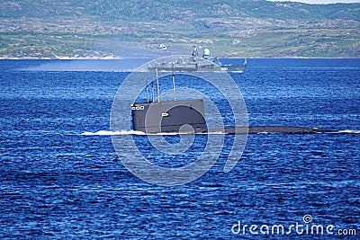 A Russian Kilo Class diesel-electric submarine is diving in Kola Bay, Russia. Stock Photo