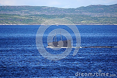 A Russian Kilo Class diesel-electric submarine is diving in Kola Bay, Russia. Stock Photo