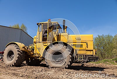 Russian Kirowez K 700 tractor on a track Editorial Stock Photo