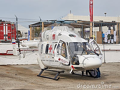 Russian medical helicopter Ansat is demonstrated at the exhibition area on the Black Sea coast in the parking. Editorial Stock Photo