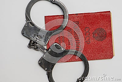 The Russian military ID card has handcuffs on it. Translation into Russian: USSR, Military ID, Ministry of Defense.Concept: mobili Stock Photo