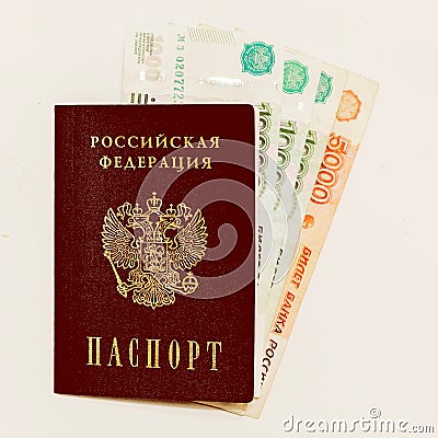 Russian passport and cash on whine Stock Photo