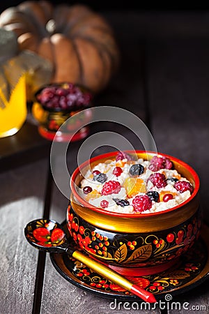 Russian porridge with pumpkin in hohloma dish Stock Photo