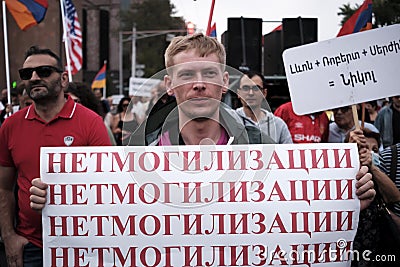 Russian protester with a poster against mobilization at a demonstration Editorial Stock Photo