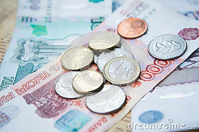 Russian roubles banknotes and euro and dollars coins Stock Photo