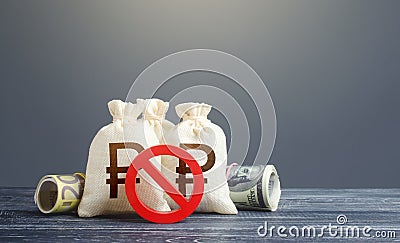 Russian ruble money bags and red prohibition symbol No. Capital export outflow restrictions. Sanctions. Freezing assets, banning Stock Photo