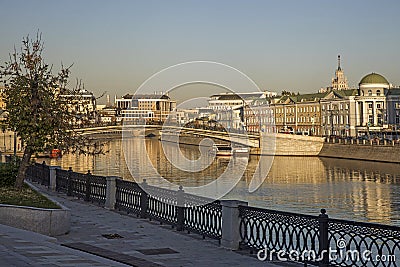 Russian scene: River trips on the Moscow river, view for the Vodootvodny canal in Moscow near Bolotnaya square at dusk Editorial Stock Photo