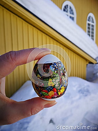 russian tradition, colorful egg in a hand Stock Photo