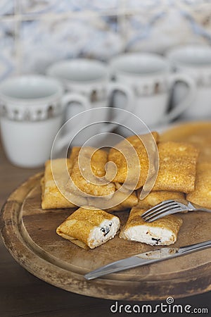Russian traditional pancakes or blini with cottage cheese Stock Photo