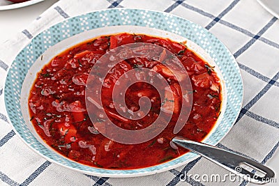 Russian and ukrainian national food - red beet soup, borscht . Closeup Stock Photo