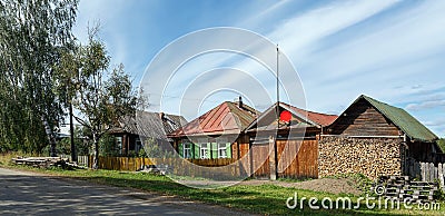 Russian village in summer. Panorama of the village street. Village of Visim, Sverdlovsk region, Russia Stock Photo