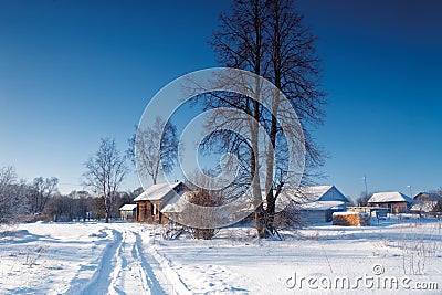 Russian winter village, snow, sun Stock Photo