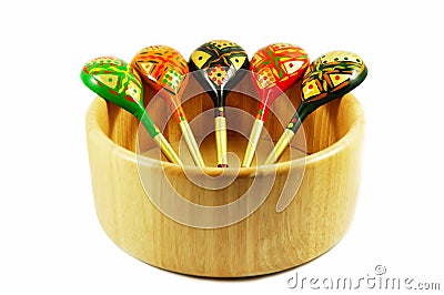 Russian wooden spoons on wooden bowl Stock Photo