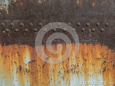 Rust metal texture with riveting, abstract grunge background Stock Photo