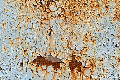 Rust, rusty background, rusty metal texture with remnants of blue paint, rust protruded through the paint Stock Photo