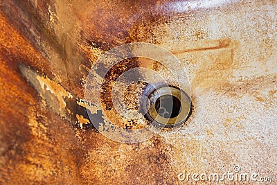 Rust stains in bathtub drain. High level Iron dissolved in a water. Ferrous Iron Stock Photo