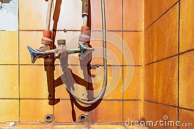 Rust stains on wall and fauct. High level Iron dissolved in a water. Ferrous Iron Stock Photo